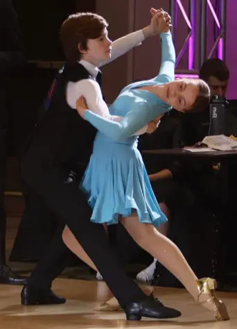 Youth dance lessons photo of kids dancing ballroom.